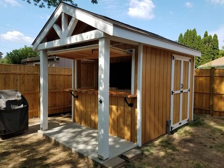 Shed refinished with white trim